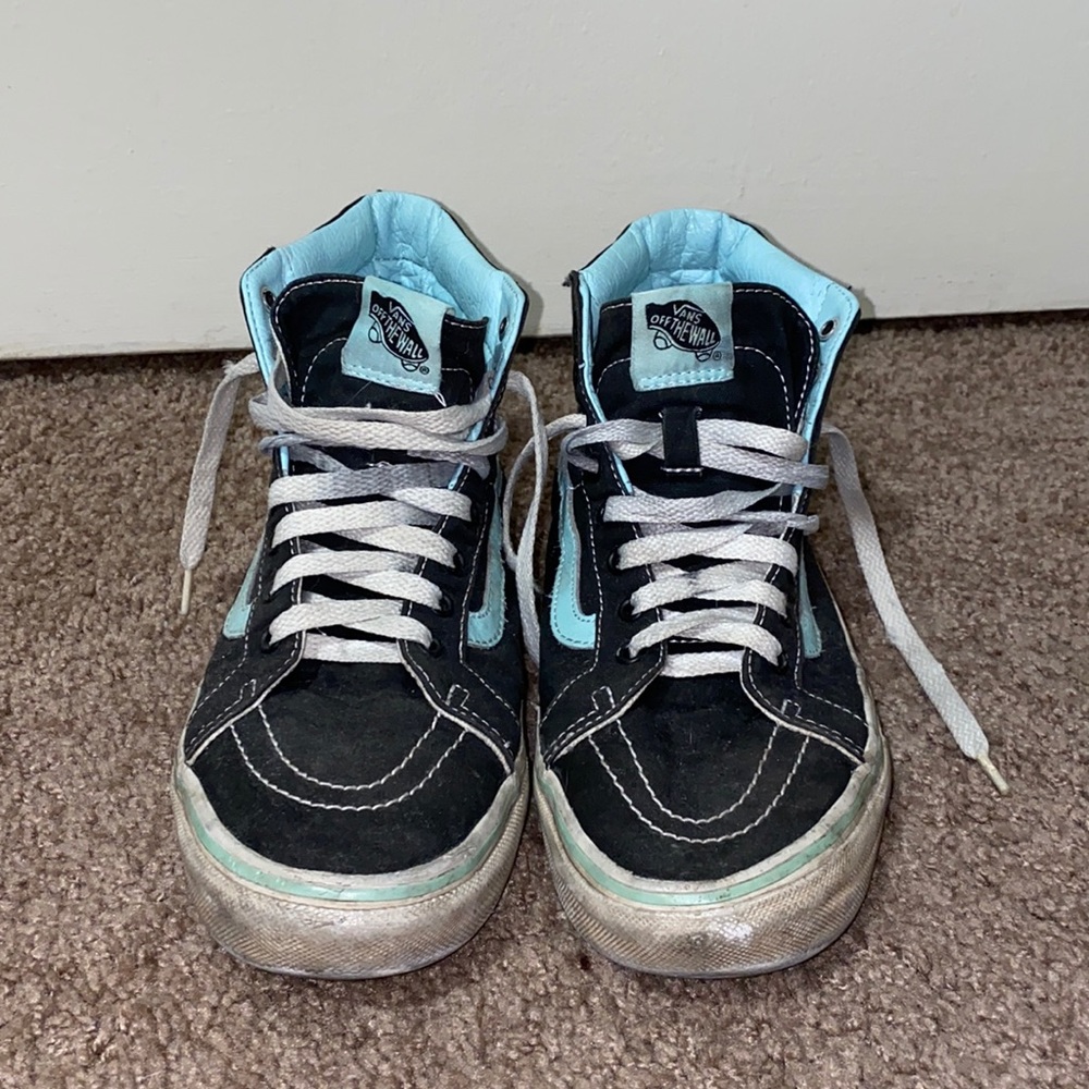 black & blue hi-top Vans